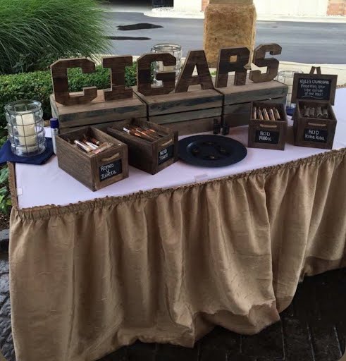 Rustic outdoor cigars event setup
